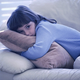 An abused child awaits her single allotted hour of television per day.